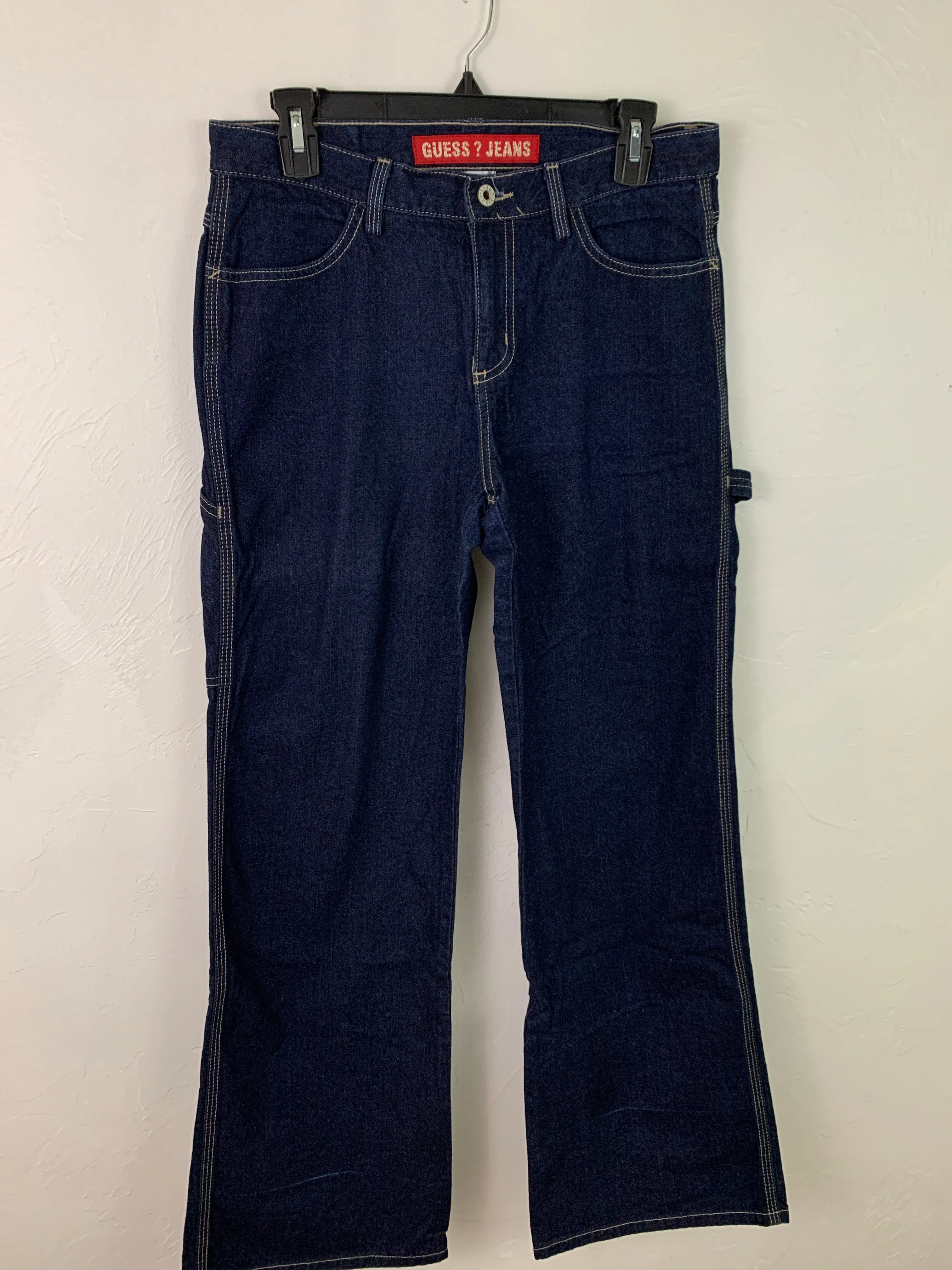 Dark wash Guess carpenter flair jeans