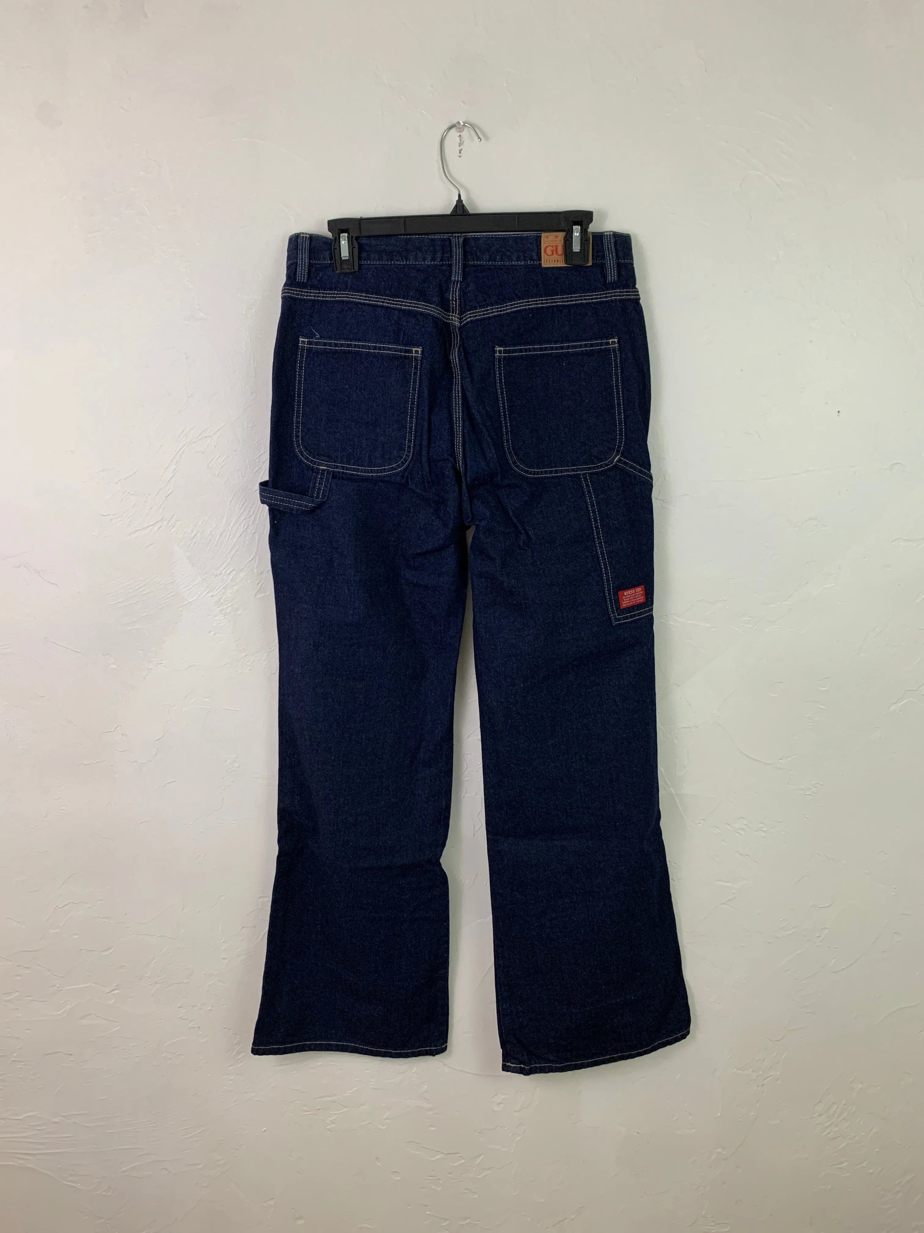 Dark wash Guess carpenter flair jeans
