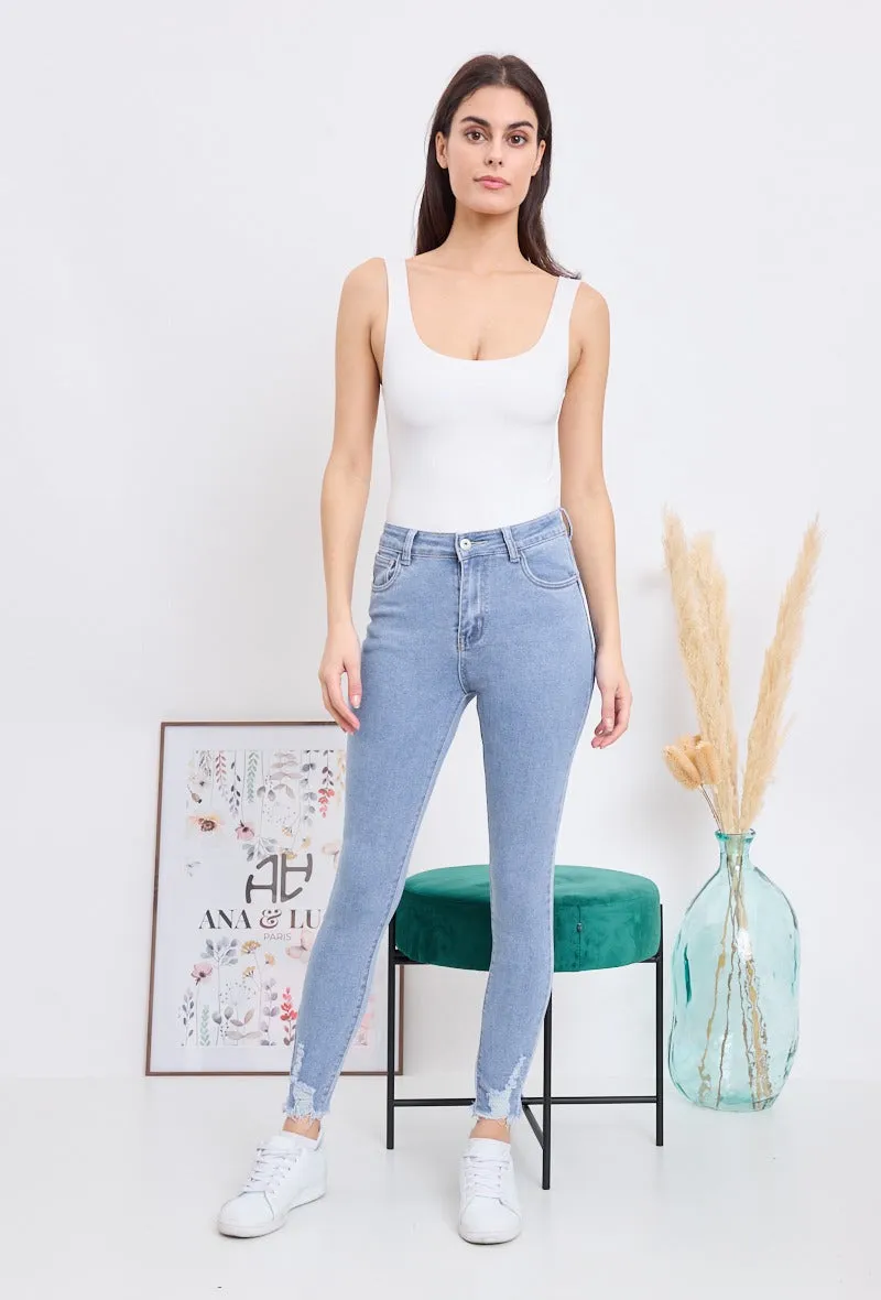 Wholesale Denim Push Up Skinny Jeans With Ripped and Frayed Hem Effect