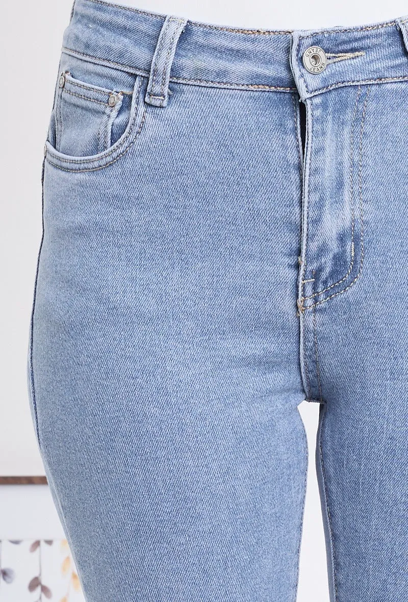 Wholesale Denim Push Up Skinny Jeans With Ripped and Frayed Hem Effect